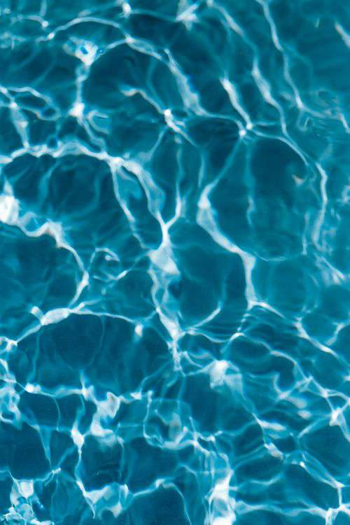 Wavy water surface in a swimming pool