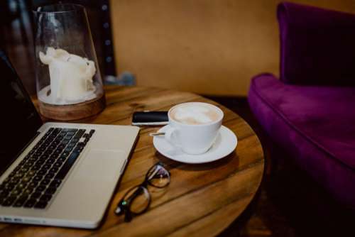 Cup of coffee on table in cafe