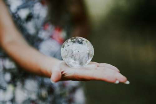 Woman with a little crystal ball