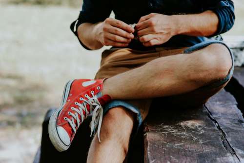 Man in a red sneaker shoes