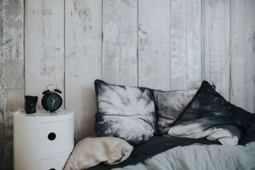 Collection of grey and white pillows