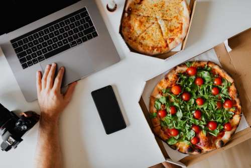 A workplace full of pizza