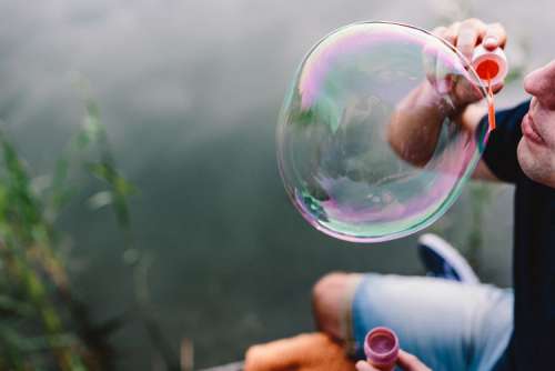 Having fun with soap bubbles in the nature