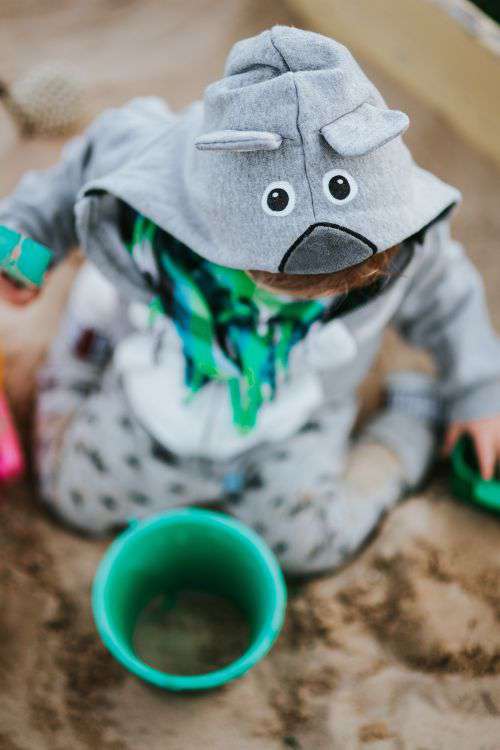 Toddler playing in the sand