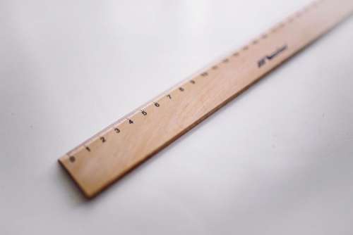 Bicycle paper clips and a wooden ruler