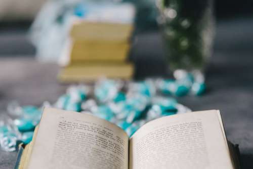 Book and blue candy