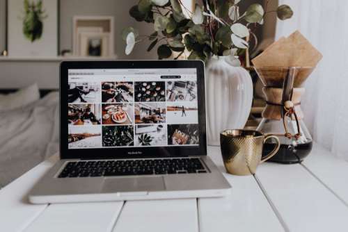 Apple MacBook & Coffee on the white desk