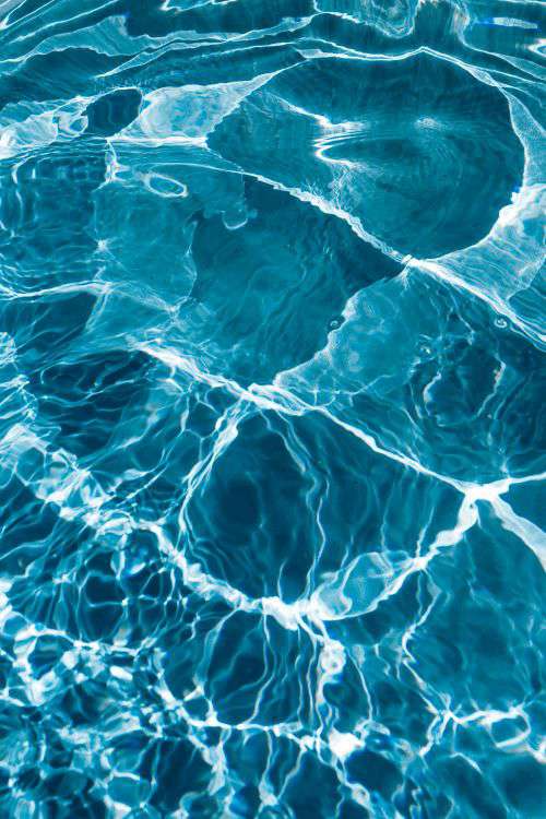 Wavy water surface in a swimming pool