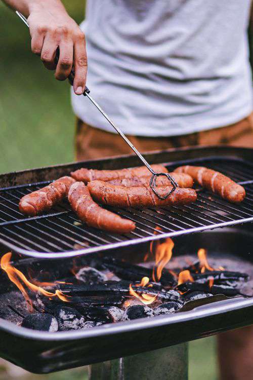 Pork and sausage on the grill