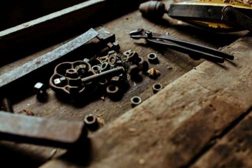 Tools, nails and bolts in a workshop