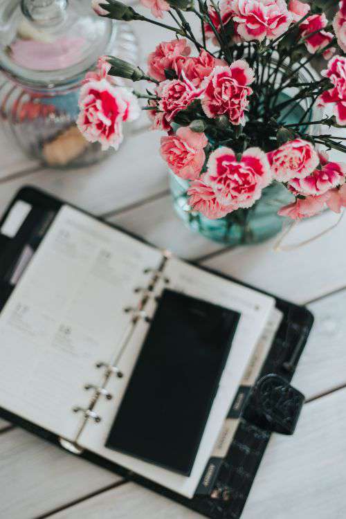 Pink flowers with a calendar