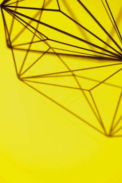 Geometric decoration on yellow background