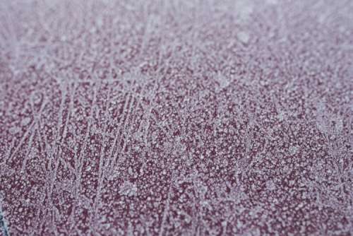 Frost on a red car