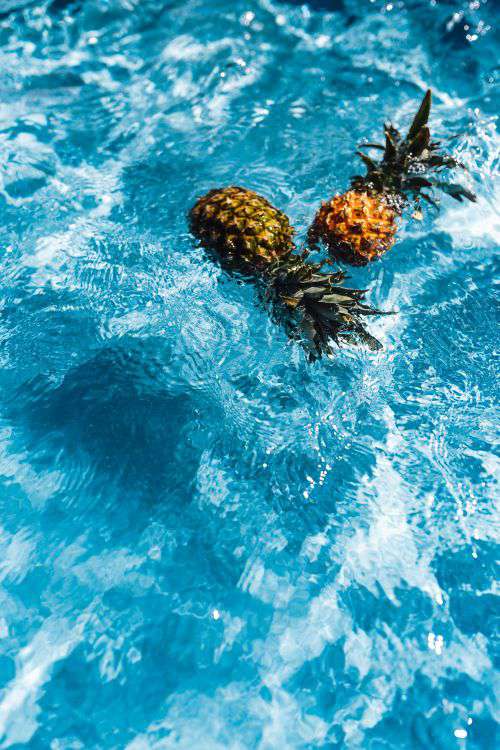 Pineapple in a swimming pool