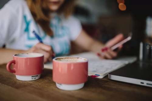 Young woman working in a cafe