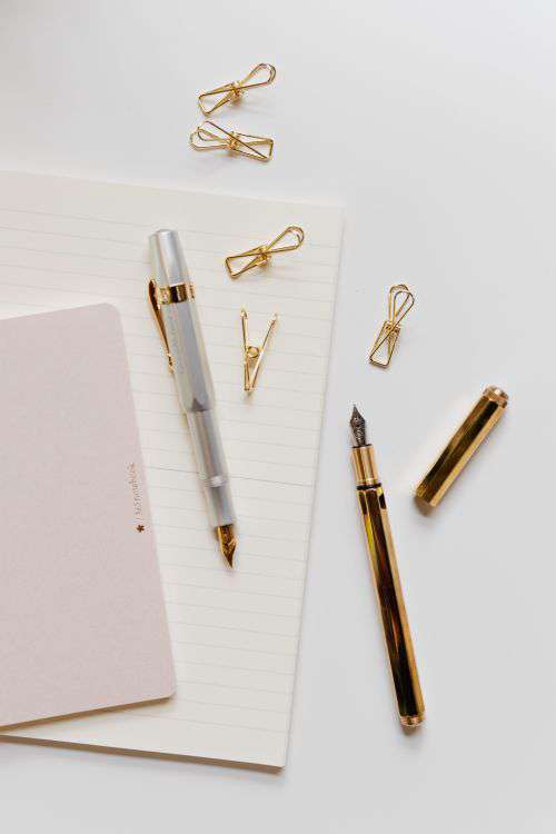 Office supplies on a white desk