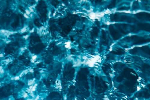 Wavy water surface in a swimming pool