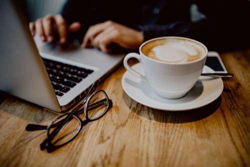 Cup of coffee on table in cafe