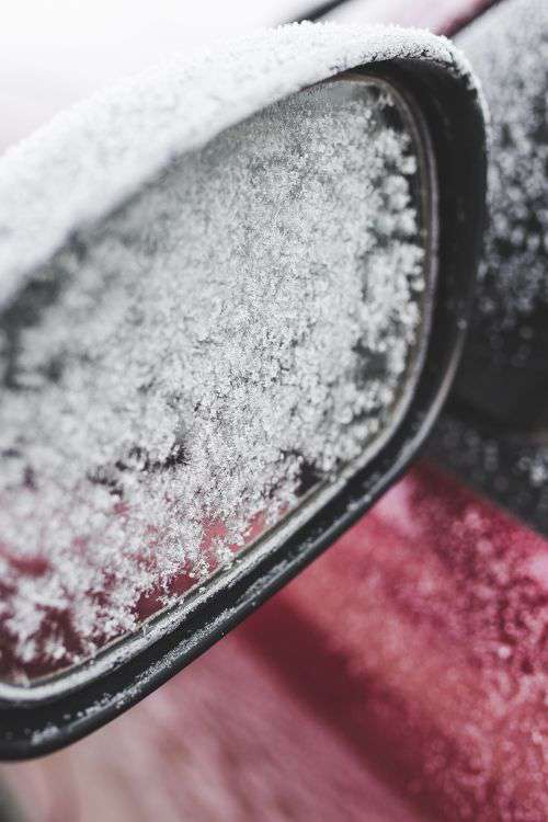 Frost on a red car