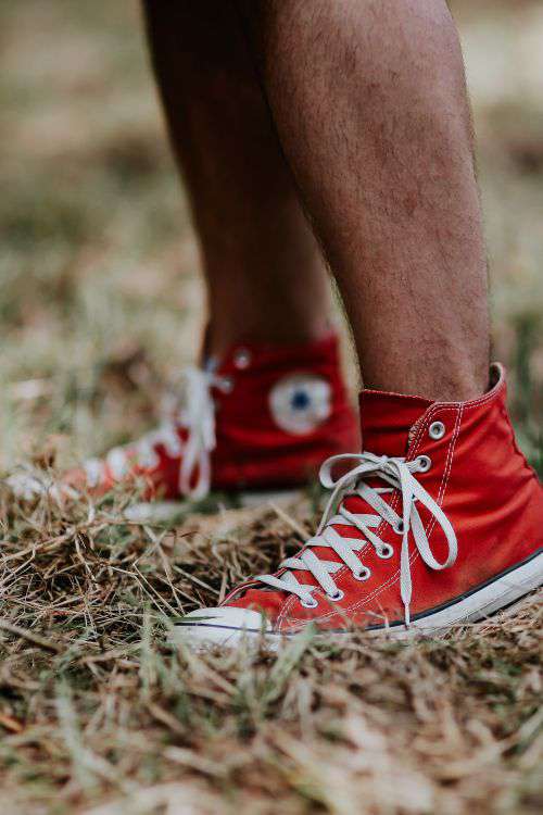Man in a red sneaker shoes