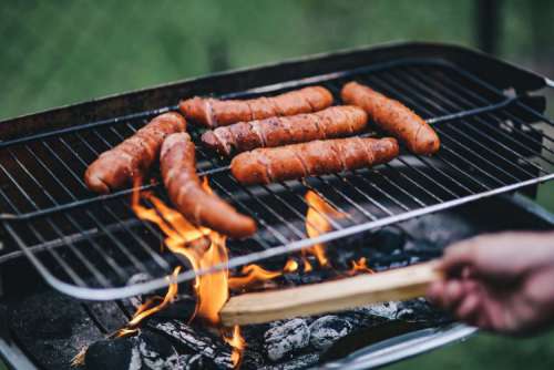 Pork and sausage on the grill