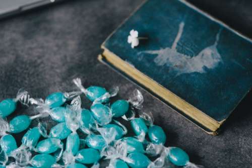 Book and blue candy