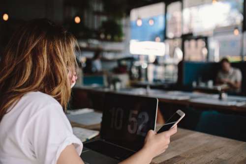 Young woman working in a cafe