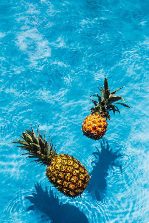 Pineapple in a swimming pool