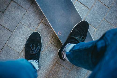 Feet on Skateboard Free Photo