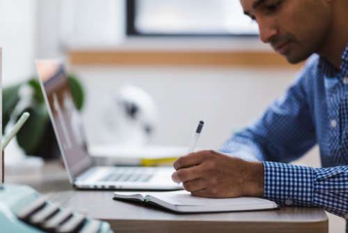 Man Writing Notepad Free Photo