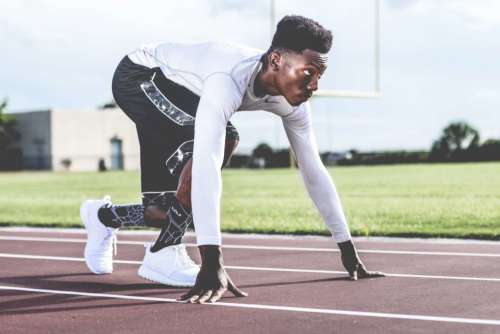 Man Running Track Free Photo