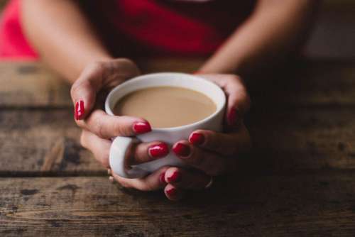 Woman Holding Coffee Free Photo