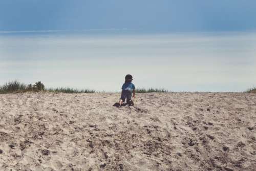 Child Crawling Sand Free Photo