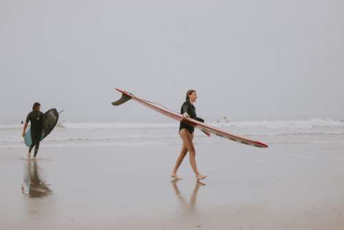 Woman Beach Surfing Free Photo
