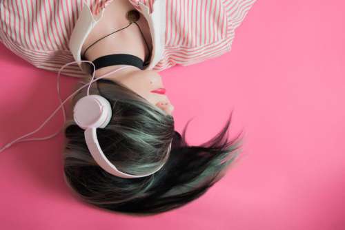 Woman Headphones Pink Background Free Photo