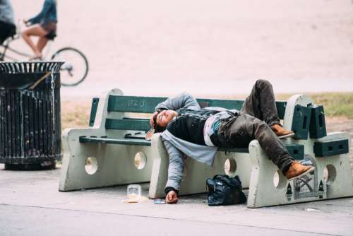 Man Sleeping Bench Homeless Free Photo