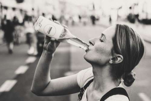 Woman Drinking Water Free Photo