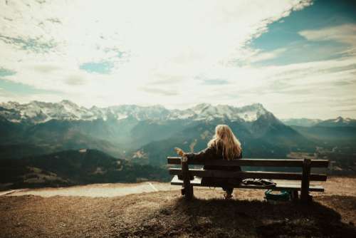 Woman Sitting Bench View Mountains Free Photo