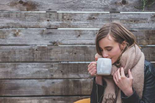 Woman Drinking Hot Coffee Free Photo