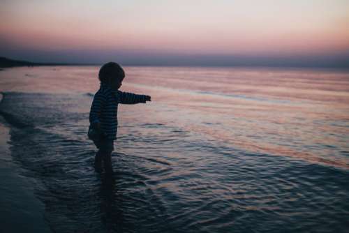 Child Boy Beach Sea Dusk Free Photo