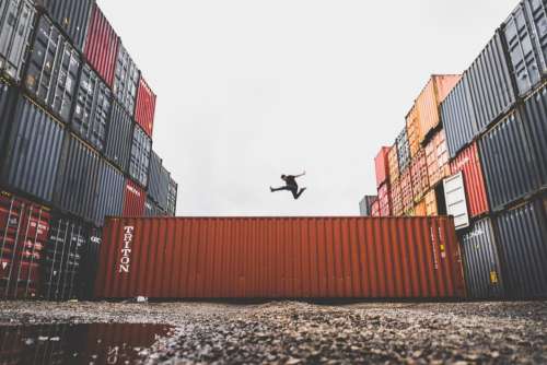 Man Jump Container Docks Free Photo
