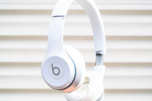 White Beats Headphones Hand Free Photo