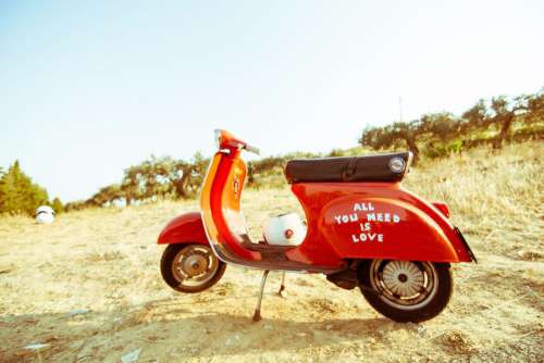 Vintage Red Vespa Beach Free Photo