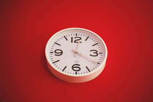White Wall Clock Red Background Free Photo