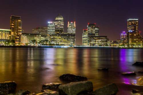 Riverside View of Skyscrapers Free Photo