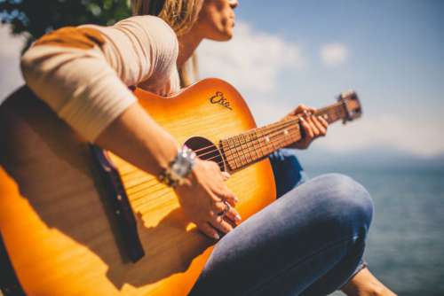Woman Playing Guitar Free Photo