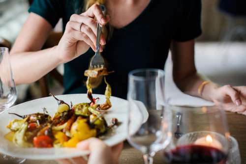 Woman Eating Dinner Free Photo