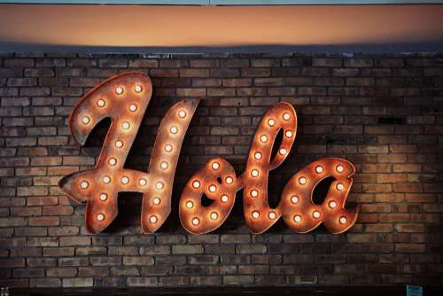 Retro Hola Neon Sign Free Photo