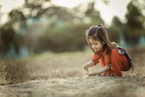 Girl Child Playing Sand Free Photo