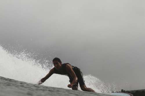Man Surfing Sea Free Photo